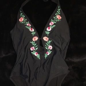 Black and floral embroidered one piece